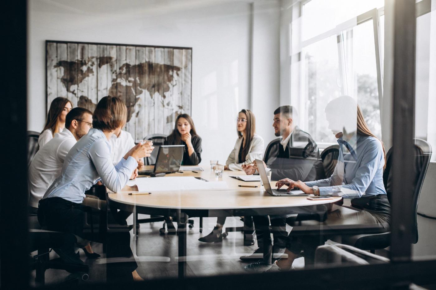 Team collaborating on campaign planning in a modern office