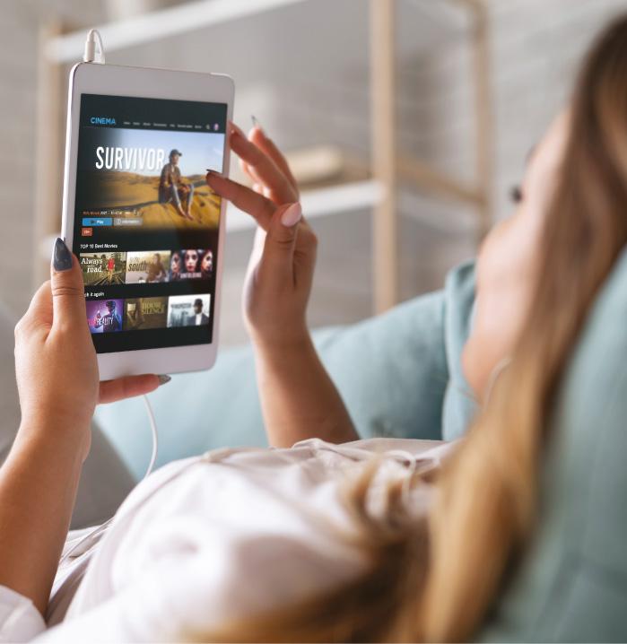 Person watching premium streaming content on a tablet